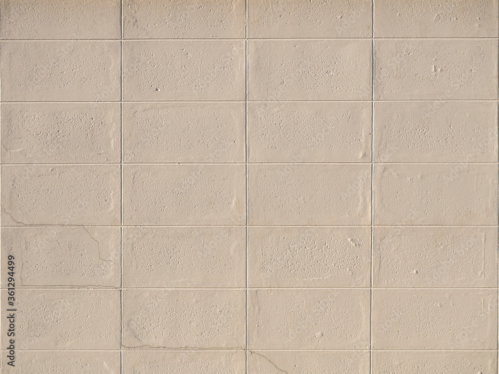 beige color concrete wall texture background. Block, rectangle, or checked pattern. beige color concrete wall texture background. Block, rectangle, or checked pattern.