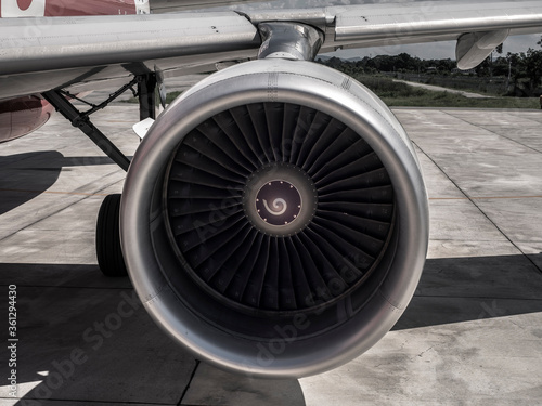 Aircraft jet engine turbine on ground.