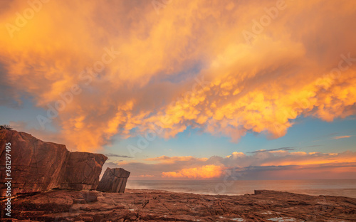 Beautiful Mammatus clouds over scenic rock shelf. At Boat Harbour,Port Stephens,Hunter Region,East Coast of N.S.W. Australia.