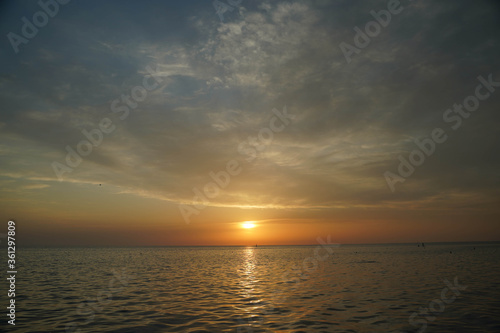 beautiful sunset and sky over the sea © Alex Barera