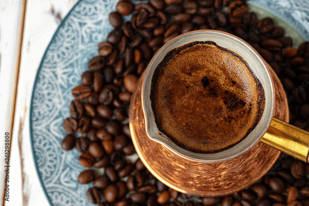 Coffee in copper turk on coffee beans Coffee in copper turk on coffee beans
