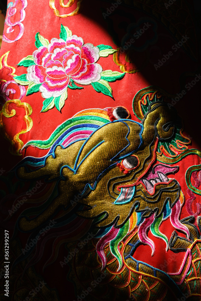 The red dragon pattern in the Chinese style temple of Thailand