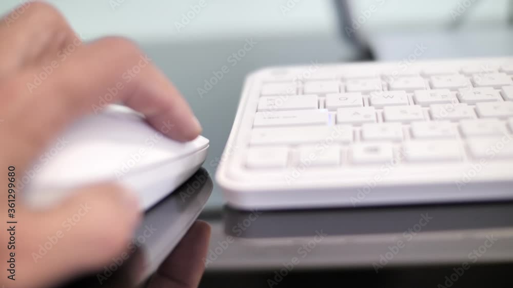 Using left handed mouse, desktop computer keyboard typing, keypad writing Using left handed mouse, desktop computer keyboard typing, keypad writing