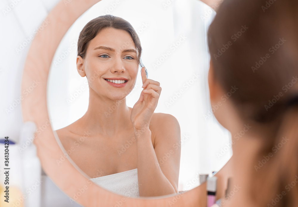 Pretty young lady making her morning beaity routine Pretty young lady making her morning beaity routine