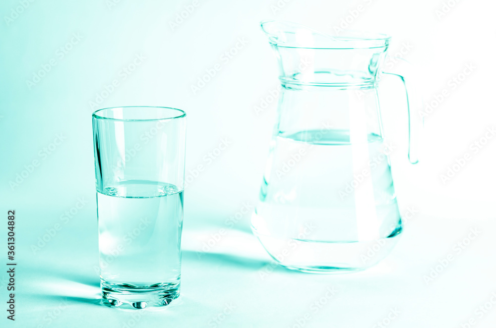 Glass with clean clear water on a white background Glass with clean clear water on a white background