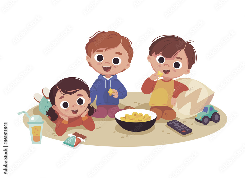 Children watching TV and eating popcorn. Spending time with friends. Children amazed by breathtaking movie. Children watching TV and eating popcorn. Spending time with friends. Children amazed by breathtaking movie.