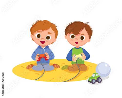 Portrait of two boys excitedly playing video games on game console. Boy play video games. Kids activity at home.
