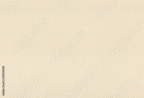 Sheet of textured ivory coloured creative paper background. Extra large highly detailed image.