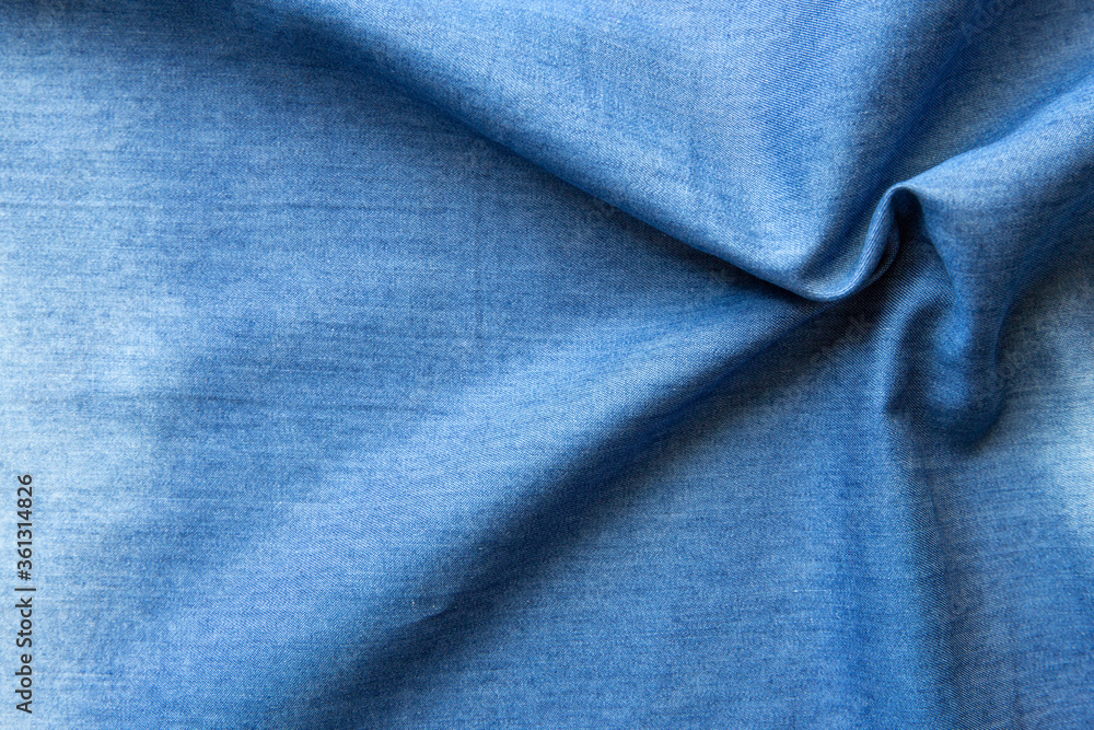Obraz premium Abstract fabric texture of blue jeans. Denim combined background. Blue denim.