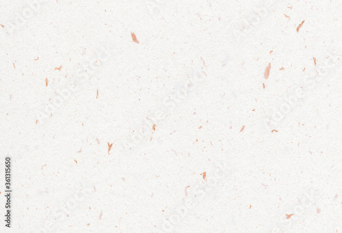 Close up view of recycled paper background with inclusions of golden particles. Extra large highly detailed image.