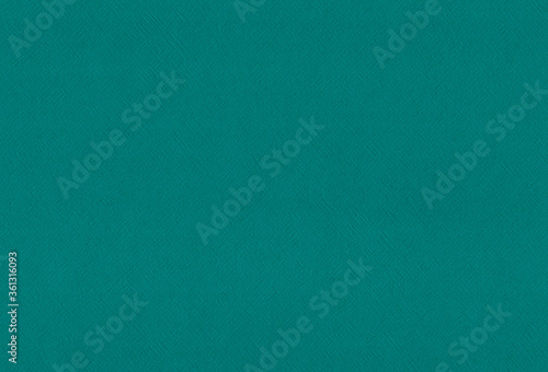 Sheet of textured turquoise coloured creative paper background. Extra large highly detailed image.