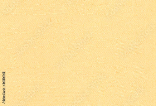 Close up view of textured pale orange coloured creative paper background. Extra large highly detailed image.