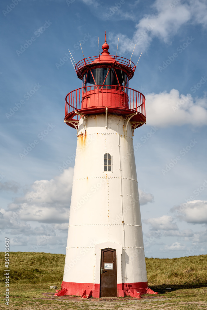 Historic lighthouse List West located on Sylt's Ellenbogen peninsula, a nature reserve on the Wadden Sea island, Germany.