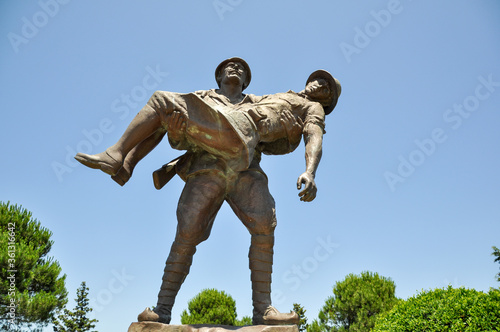 Canakkale, Turkey - June 24, 2011:Statue of a Turkish soldier carrying an injured ANZAC soldier, Gallipoli, Canakkale, (Dardanelles)