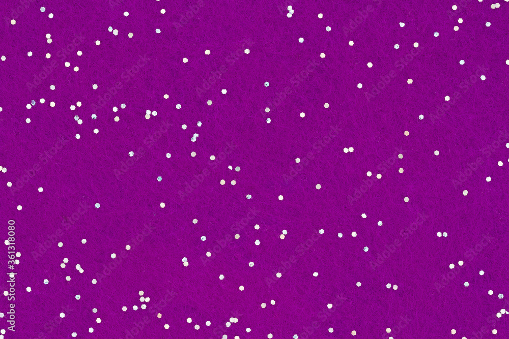Dark purple felt textured fabric with glitter closeup background