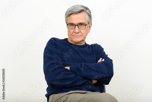 Portrait of handsome senior man with eyeglasses