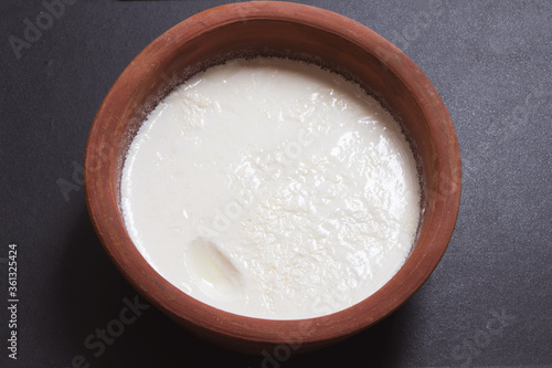 Home made curd in a earthen bowl