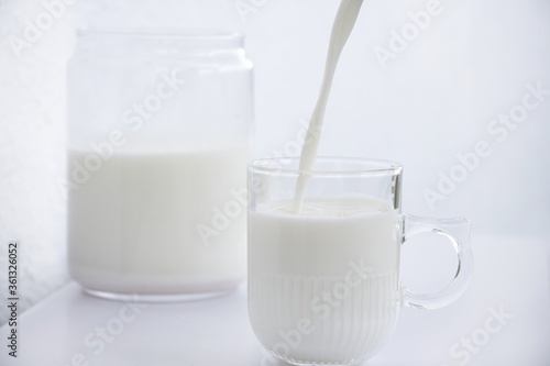 Glasses of milk with splash

