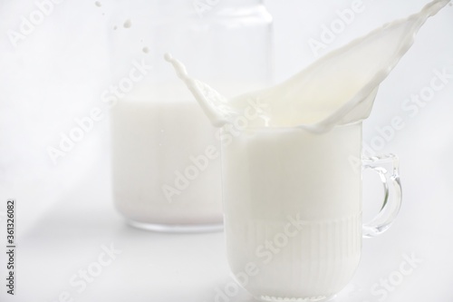 Glasses of milk with splash