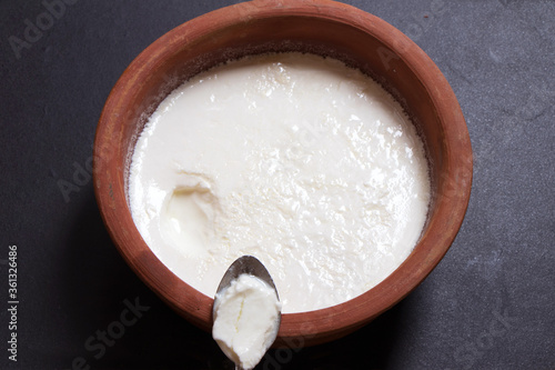 Home made curd in a earthen bowl