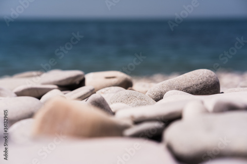 Rocks in the foreground and the sea behind. Oceania, the rocky coast of the sea. Black sea coast.