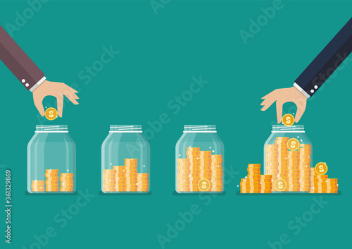 Step of Hand saving coins in glass jar