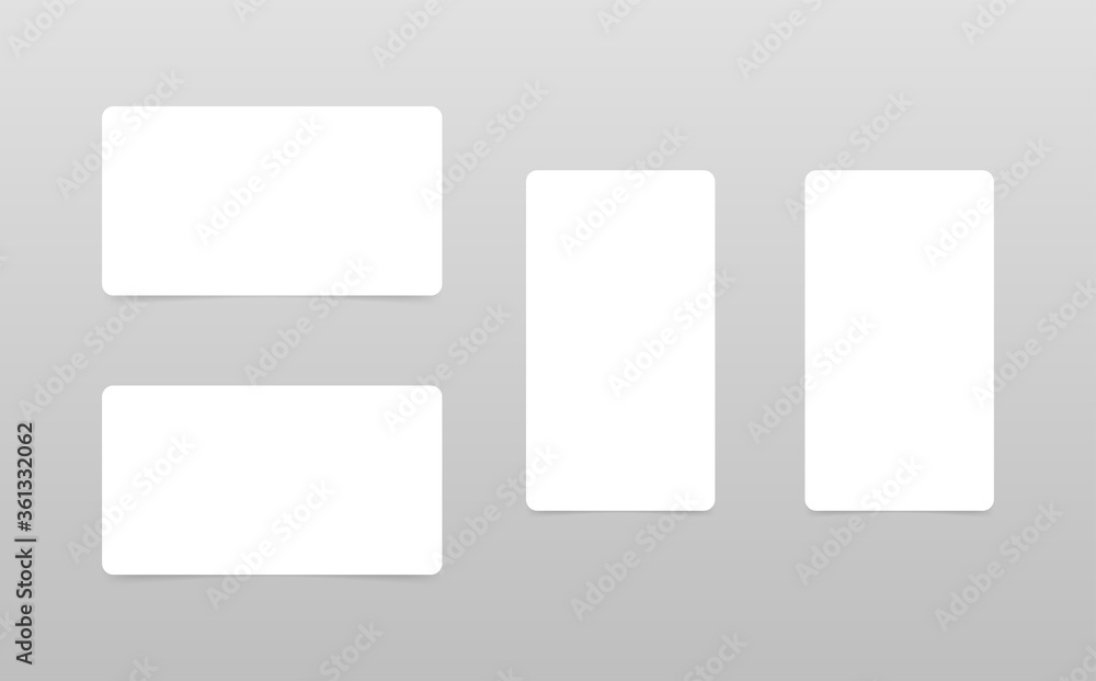 Set of white business cards mockups isolated on grey background. Set of white business cards mockups isolated on grey background.