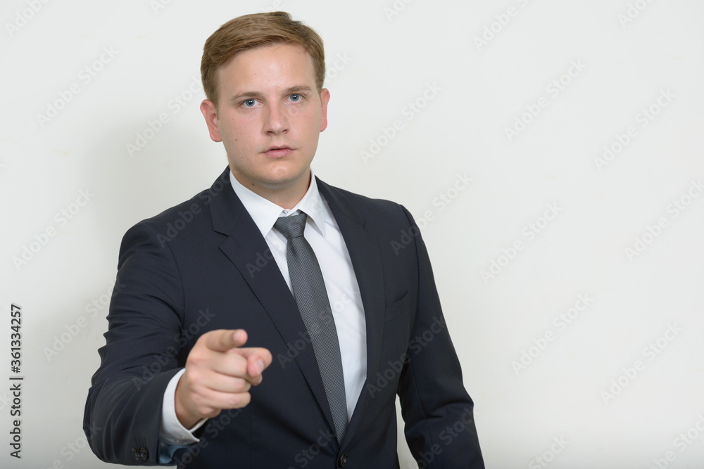 Portrait of businessman with blond hair wearing suit Portrait of businessman with blond hair wearing suit