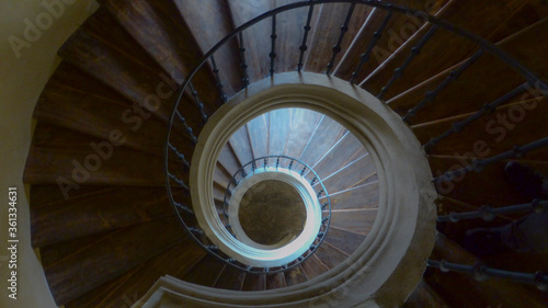 The stairs lead down in a circle.