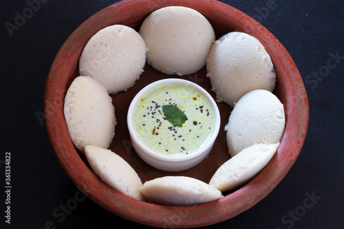  idly or rice cake, originating from the Indian subcontinent, popular as breakfast foods in southern India photo