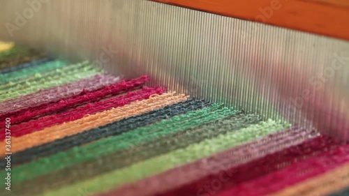 Weaving a colorful towel