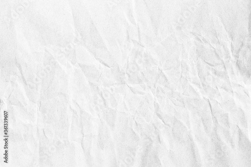 Crumpled grey paper sheet background texture