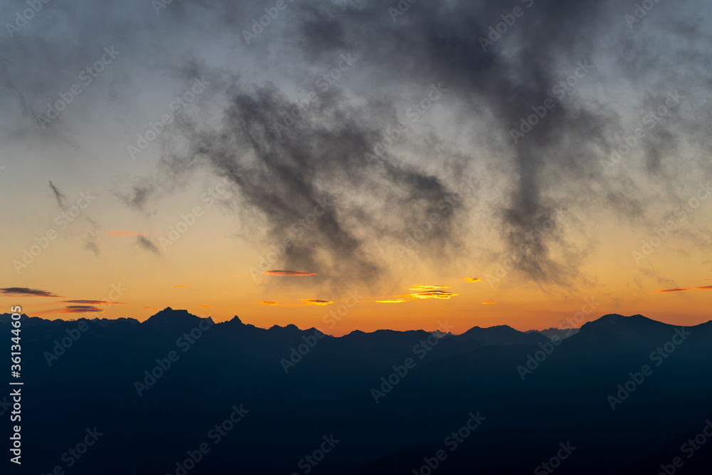 Silhouette mountains against sky at sunset Silhouette mountains against sky at sunset