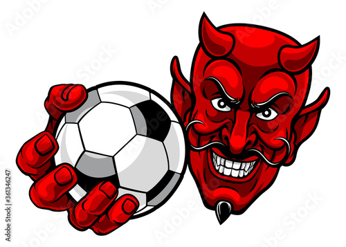 A devil or satan soccer football sports mascot cartoon character holding a ball