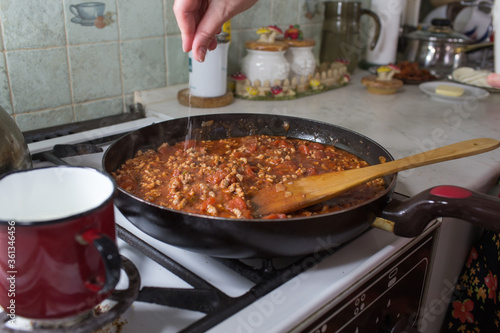 Preparation of lasagne.