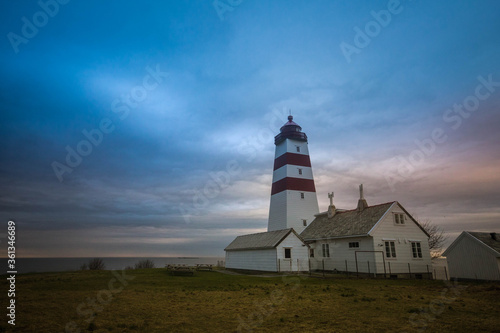 Northern lighthouse view in a small fishing village in Norway.