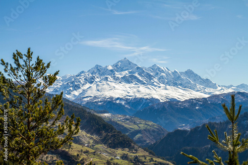 panorama of Georgia mountains and snow hat glaicer © Lahodyuk
