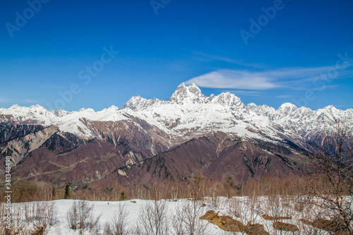 panorama of Georgia mountains Uzhba and snow hat glaicer photo