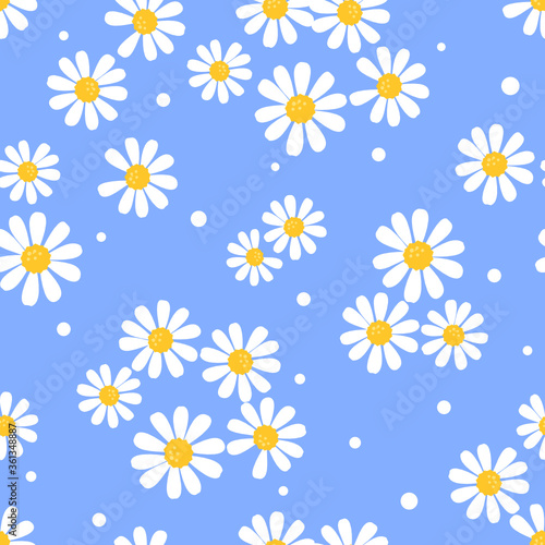 Seamless pattern with daisies on blue background vector.
