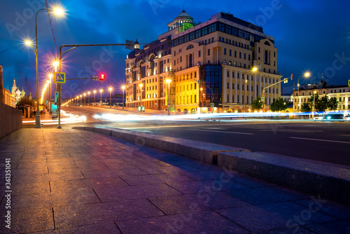 Night city, night traffic lights. City life, car light paths. Russia, Moscow, Maly Moskvoretsky bridge