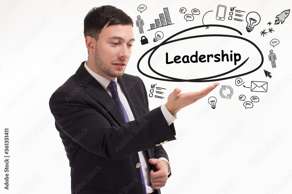 Business, technology, internet and network concept. Young businessman thinks over the steps for successful growth: Leadership Business, technology, internet and network concept. Young businessman thinks over the steps for successful growth: Leadership