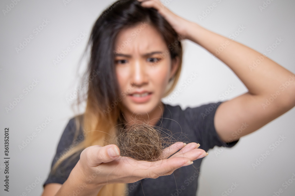 Asian women have itchy scalp, hair loss when combing their hair. Scalp health problems