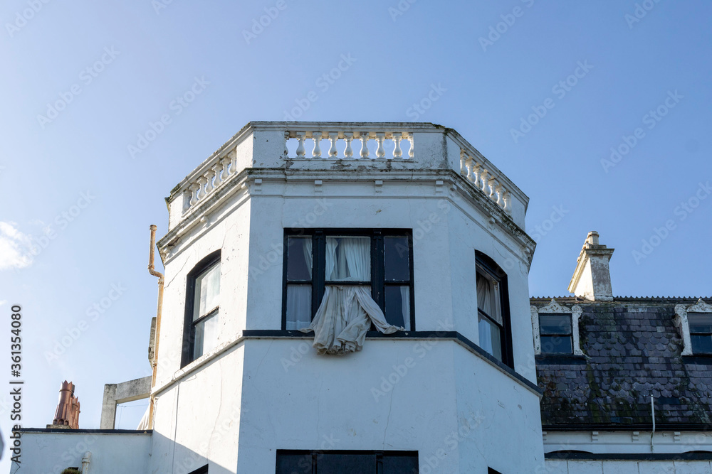 Old abandoned building with broken windows. Old abandoned building with broken windows.