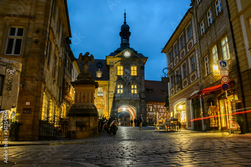 Evening view on old Town Hall Altes Rathaus on island with bridges over the Regnitz River, Bamberg, Bavaria, Germany. photo