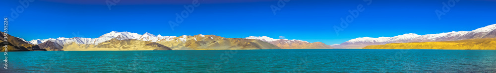 Water, desert and snow combination panorama Karakorum Highway Xinjiang China 