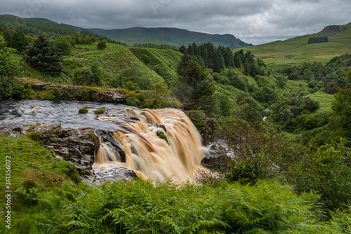 The Loup of Fintry waterfall onf the River Endrick is located approx. two miles from Fintry village, near Stirling. This impressive 94ft waterfall is best seen after a prolonged period of rain or snow photo