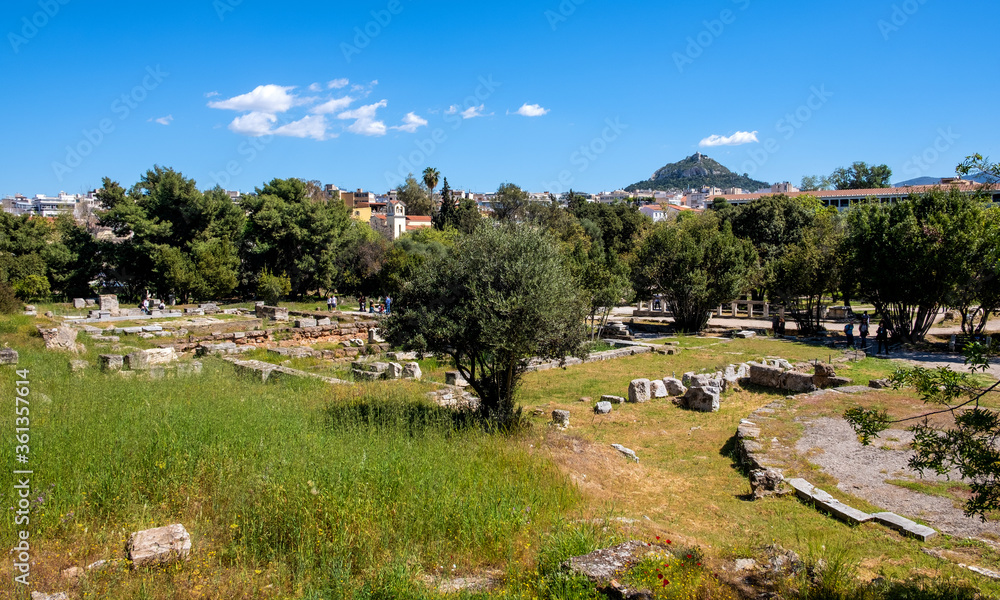 Panoramic view of ancient Athenian Agora archeological area with ruins of Metroon, Temple of Ares, Odeon of Agrippa and Gymnasium in Athens, Greece