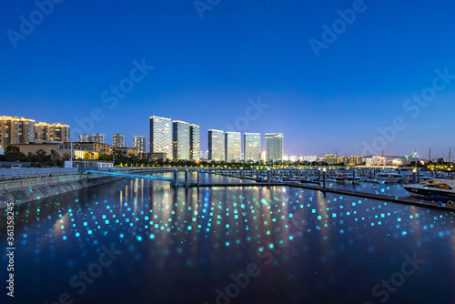 Xiamen blue tone skyline synthesized by particle lines