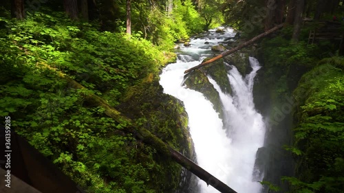 Pan Right to Reveal Sol Duc Falls, a Popular Tourist Destination in Olympic National Park, Washington State photo