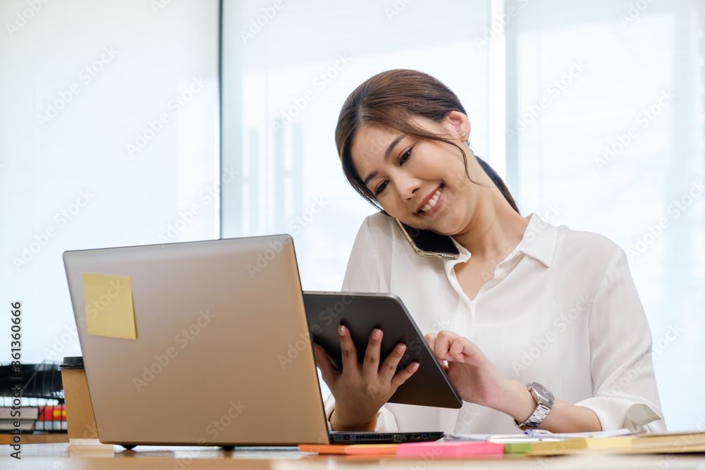 Smart beautiful Asian woman work in office Smart beautiful Asian woman work in office
